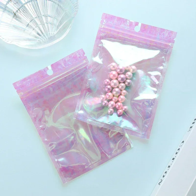 Zipper Packaging Bubble Bag 100pcs Pink Stand Up Holographic Flat Pouches Small Laser Zip Lock Plastic Bags for Cosmetic Jewelry