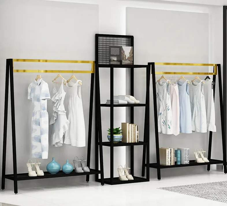 Clothes store display shelf floor type shelf black gold combination of men's and women's clothing store display shelf