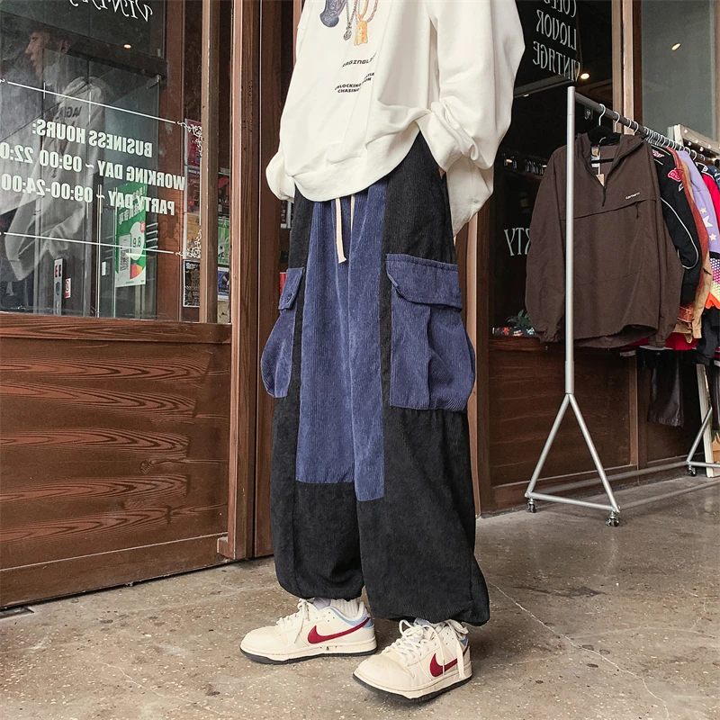 

Winter Corduroy Wide Leg Men Pants Hit Color Spliced Cargo Big Pockets Pants Male Japanese Drawstring Cuff Rock Dance Pants