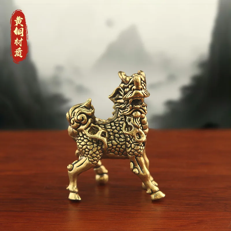 A pair of solid, life-sized, yellow-bronze, high-legged Qilin statues, representing auspicious creatures, perfect as tea pets or