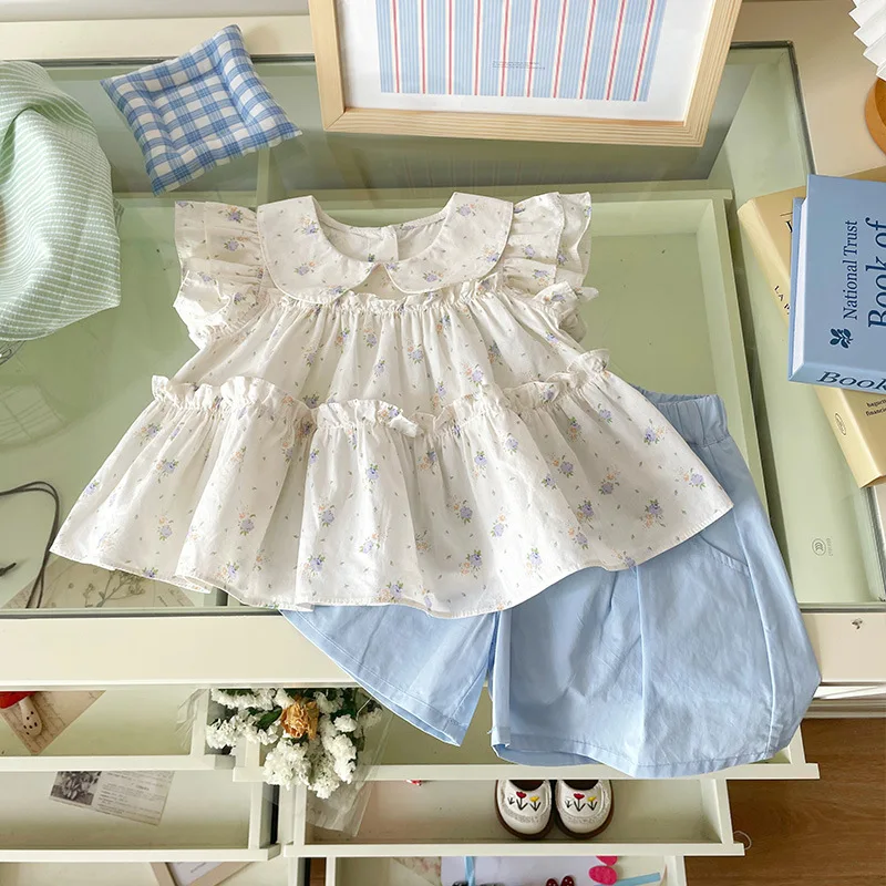 طقم بناتي 2025 صيفي جديد على الطراز الكوري بأكمام طائرة وطية صدر السترة بدون أكمام قميص وسراويل قصيرة طقم تصميم جديد #2