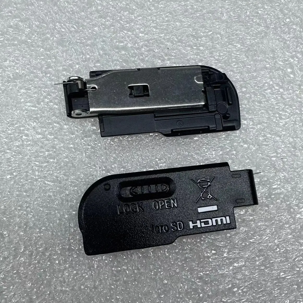 Suitable for Sony HX99 battery cover, battery compartment cover, black cover, camera accessories