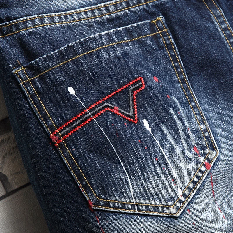 Pantaloncini di jeans strappati estivi 2024 pantaloncini da moto larghi e dritti da uomo abbinati e belli da mendicante