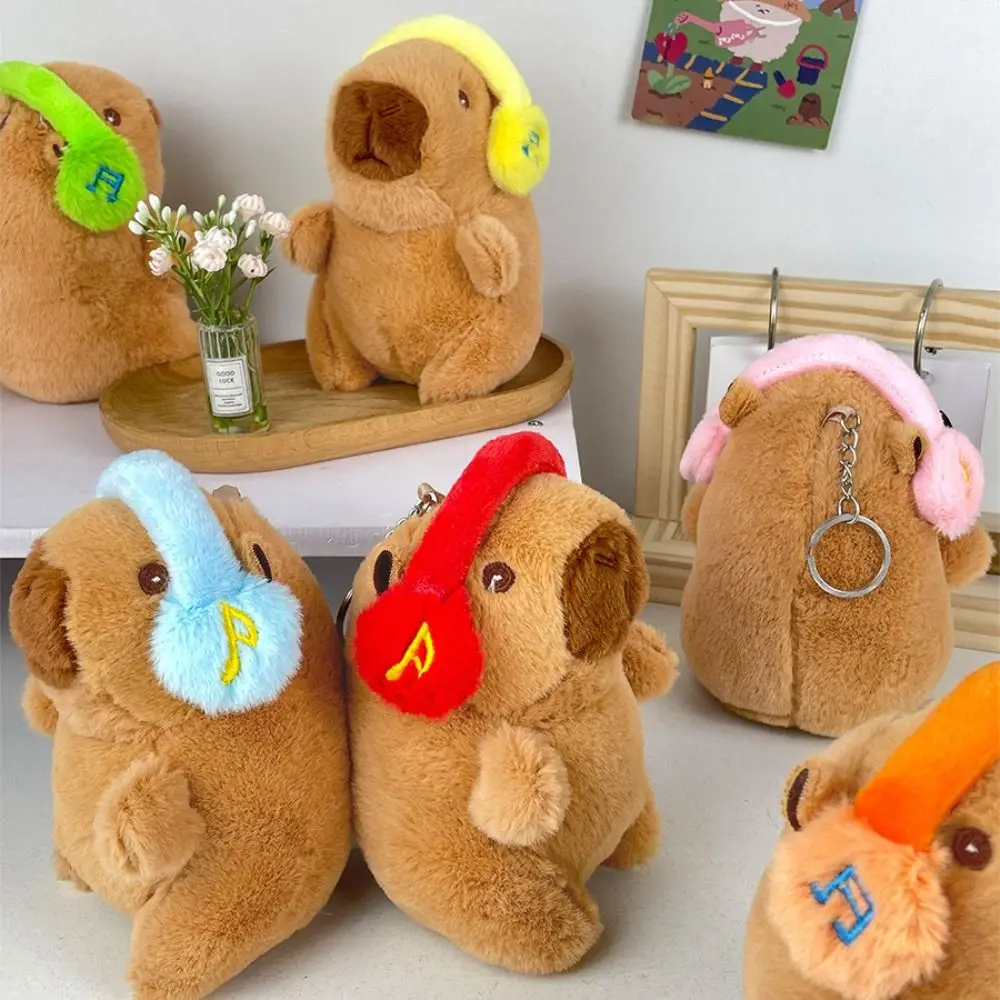 Auriculares de peluche de conejillo de indias de agua, llavero de capibara, colgantes de bolsa, muñeco de peluche de dibujos animados, llavero de capibara de peluche, Animal esponjoso