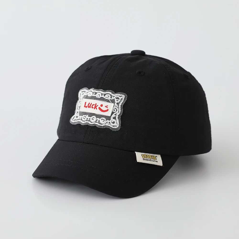 

Children's lace letter "Luck" smiling face logo quick-drying baseball cap.Fresh and gentle style.Suitable for baby girls to wear