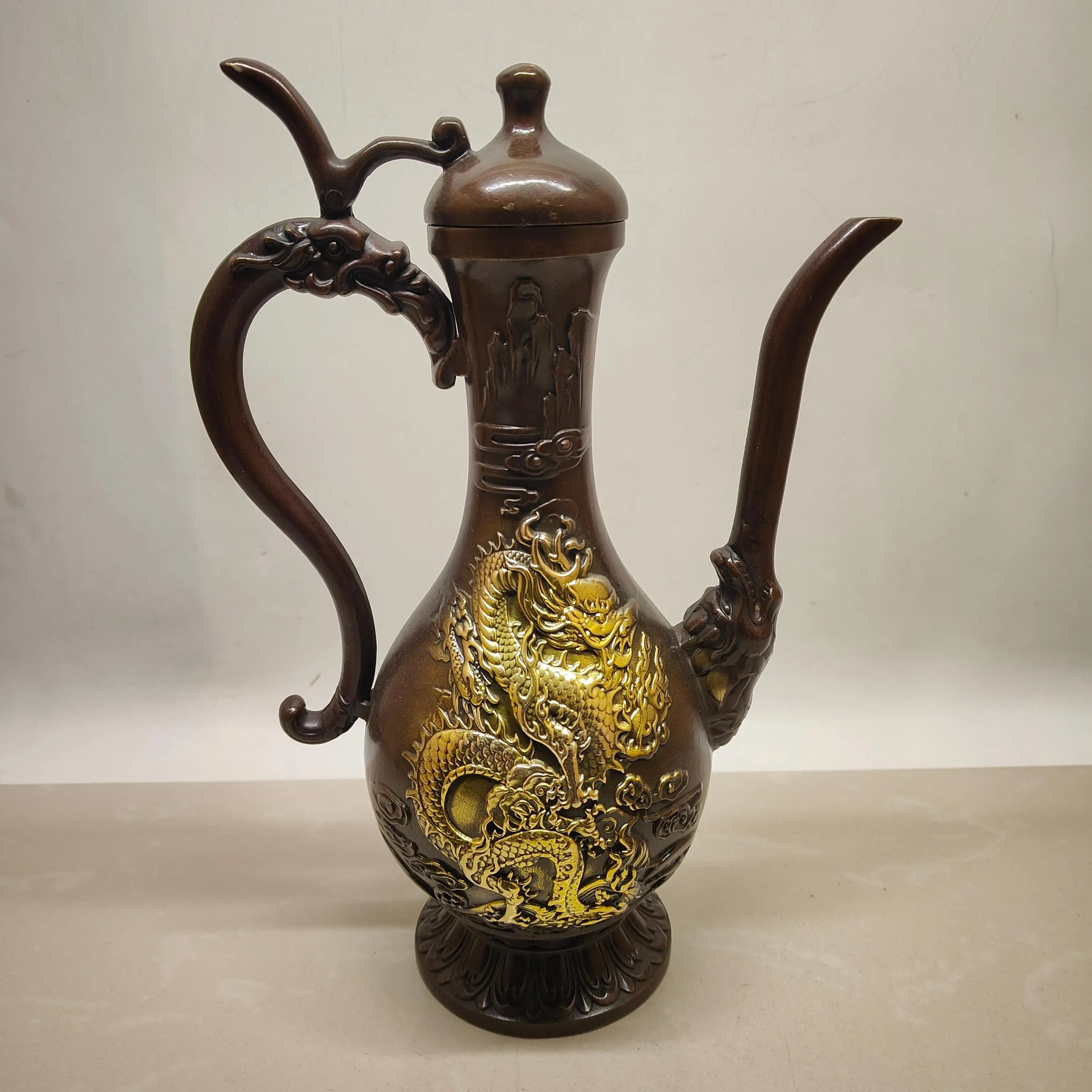 A large dragon and phoenix wine pot made of brass imitation purple copper gilded with antique craftsmanship.,Free shipping