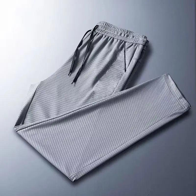 Pantaloni sportivi casual da uomo in seta di ghiaccio estiva ultrasottile Qui-Drng Aria condizionata Elastico Vestibilità ampia Fibra di poliestere Lunga Tro...