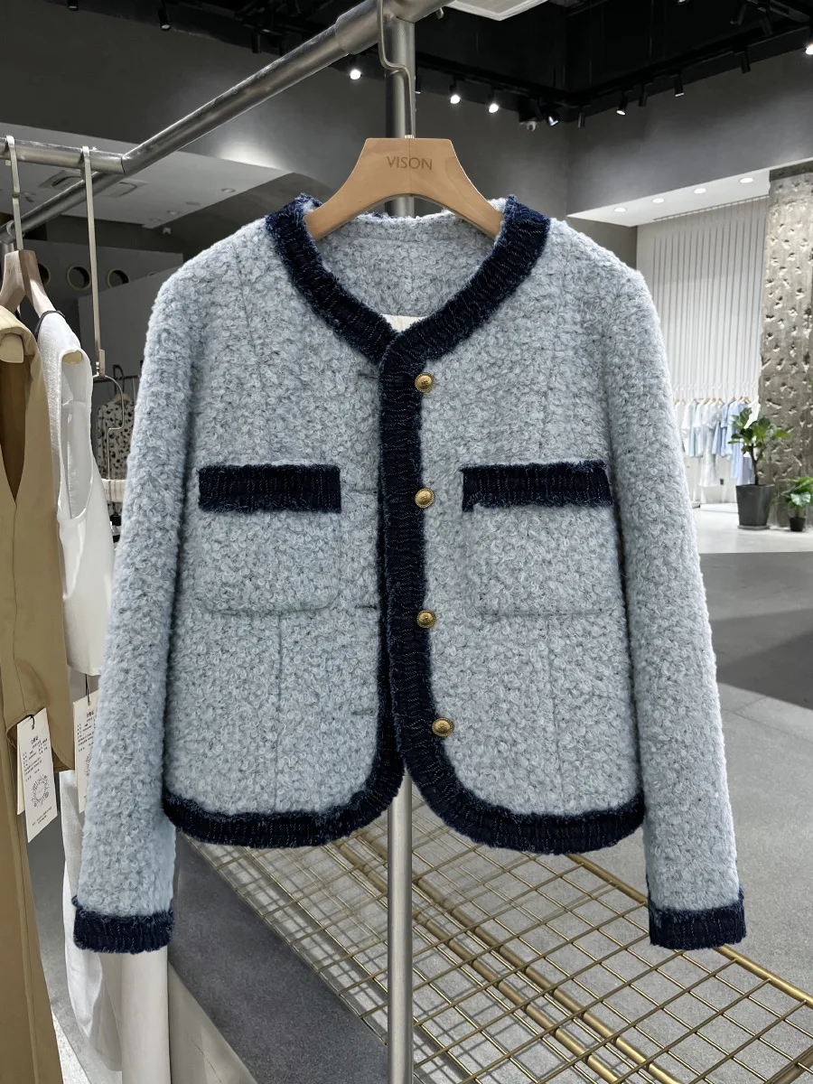 Autumn and winter women's casual solid color v-neck long sleeved pocket decoration down jacket