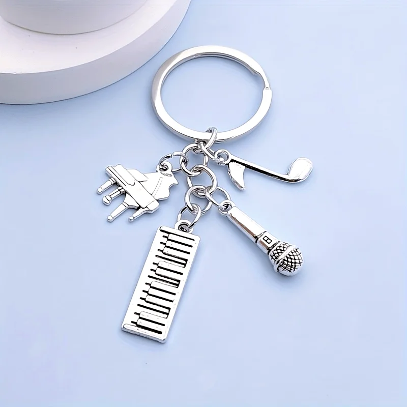 Chic Men'S Music-Themed Keychain with Piano, Microphone & Note Charms - Iron Alloy, Fashionable Backpack Accessory