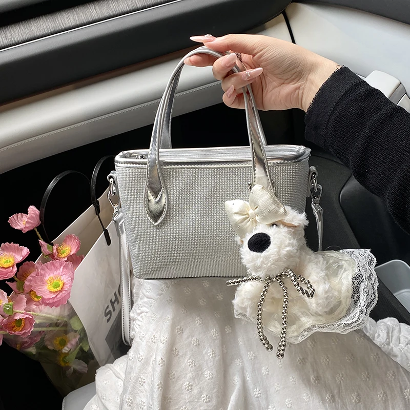 

High-end silver hand-carrying bucket bag 2025 new cute girl niche fashion shoulder bag versatile women's bag