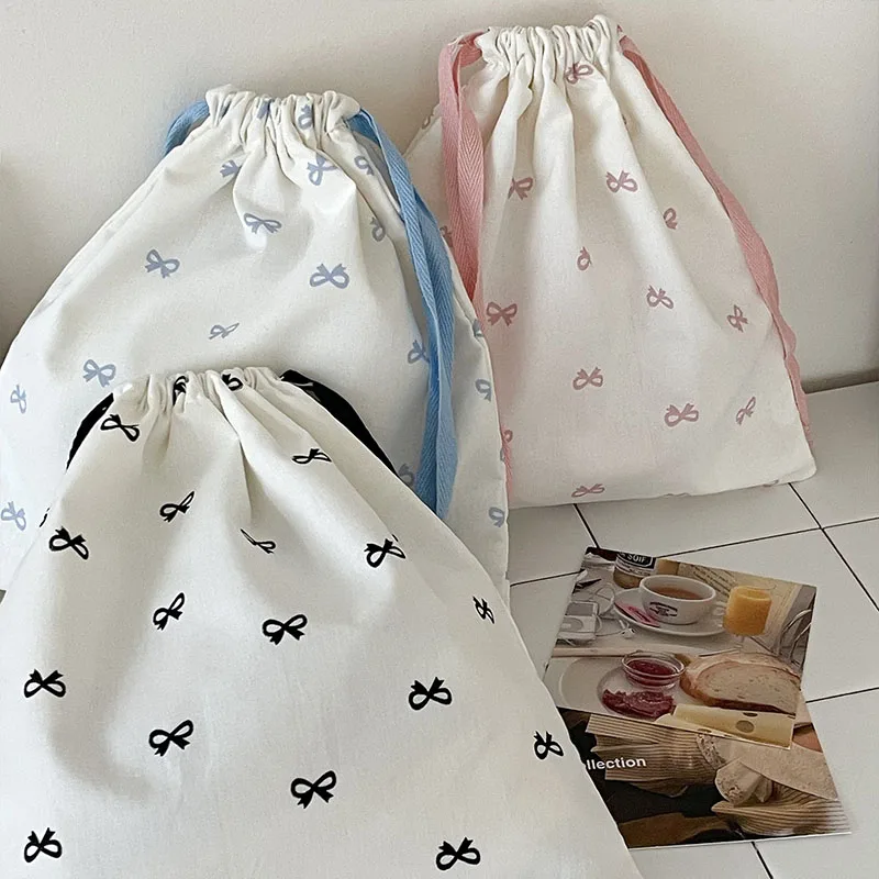 Borsa portaoggetti con fiocco coreano Canvas Sweet Kawaii Girl Artsy borsa con coulisse rossetto borsa per trucco portatile accessori per Organizer