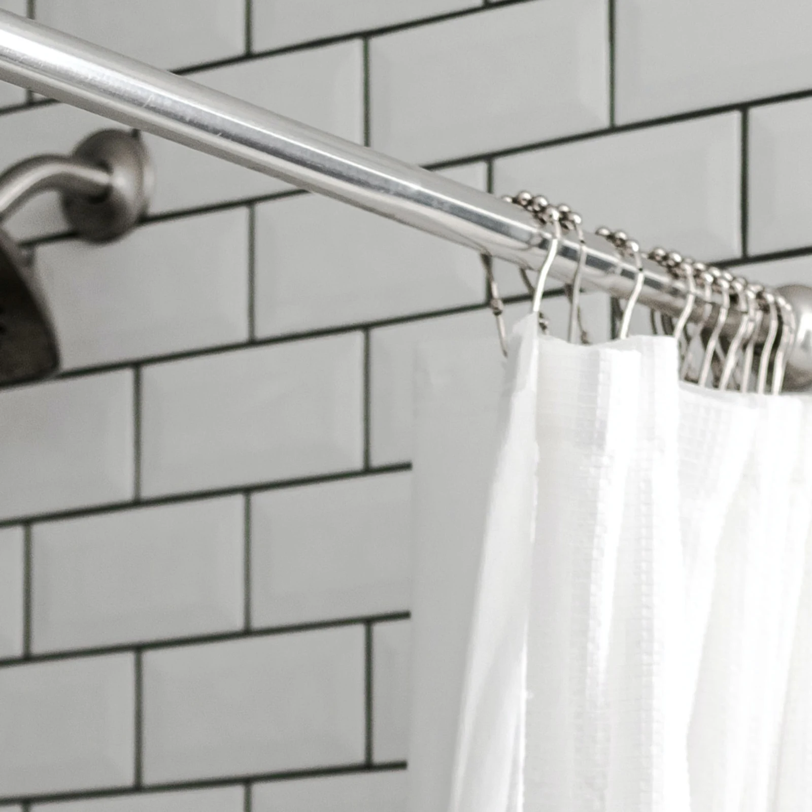 

Adjustable Curved Shower Curtain Rod 18-28 Inch Tension Mount Stainless Steel Clothes Drying Bar No Drill Installation