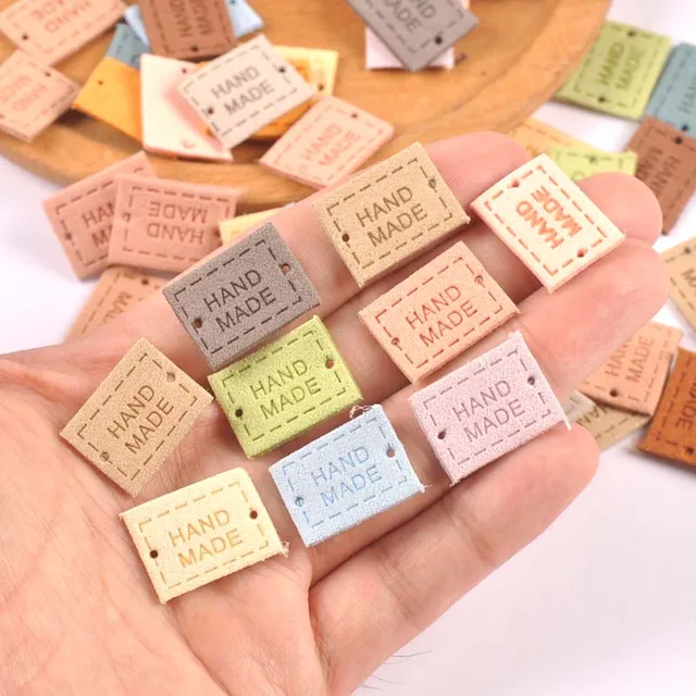 20 sztuk 2x1.6cm tkanina PU ręcznie tłoczone tagi DIY flaga etykieta na akcesoria do szycia odzieży cp3433