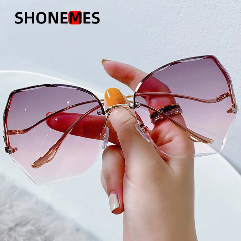 

Shonemes Rimless Sunglasses Women Curve Metal Temple Vintage Trimming Lens Outdoor Irregular Shades Oculos De Sol for Ladies