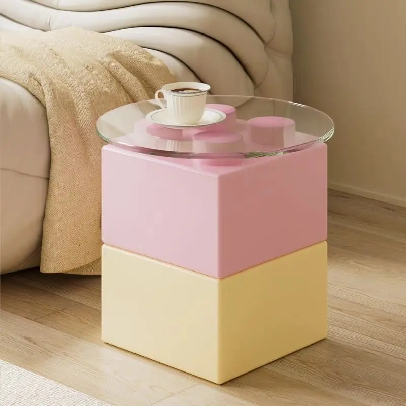 Cream wind creative building block coffee table, living room sofa next to a few dopamine bedside table
