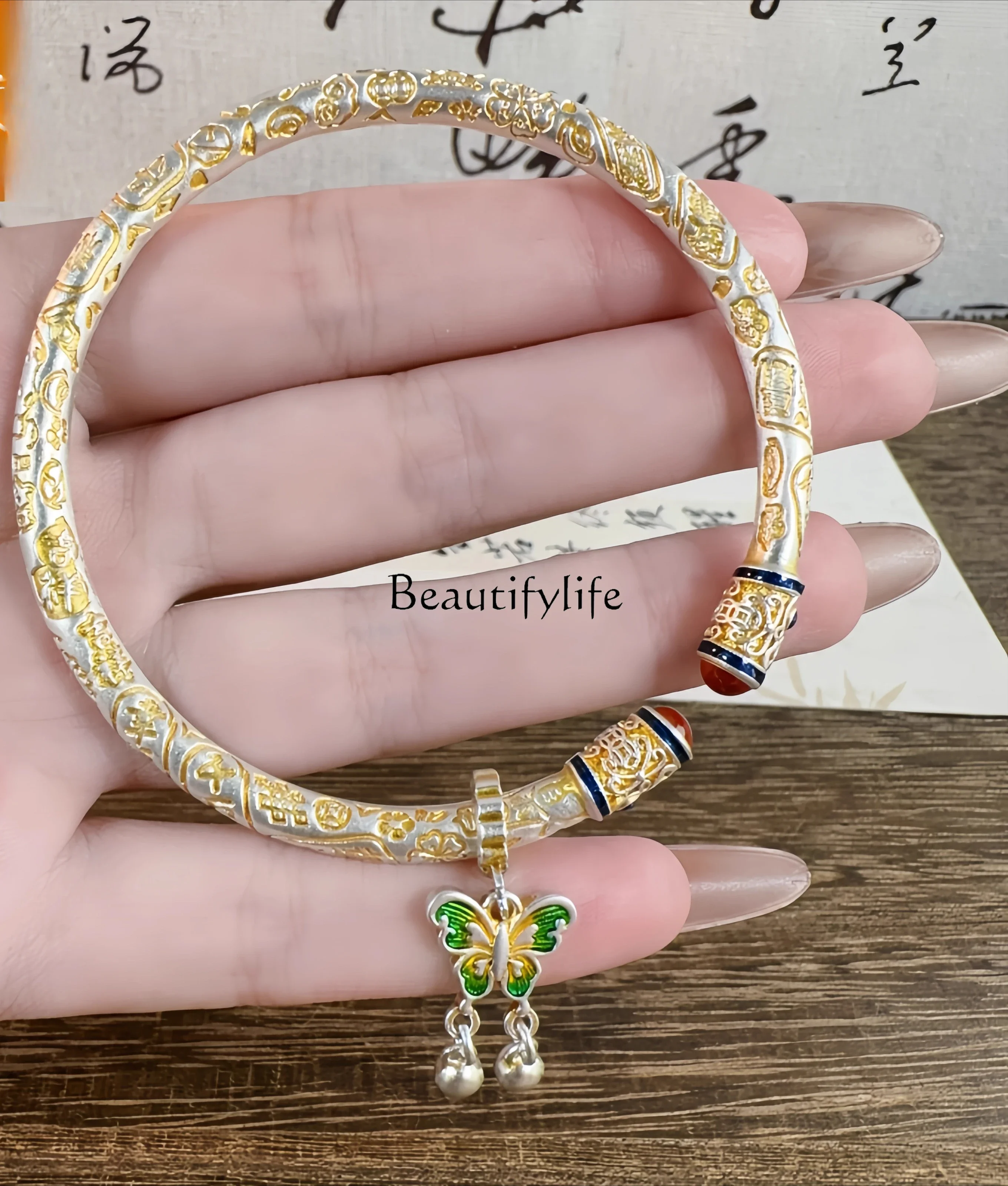 

Gold enamel color auspicious butterfly sterling silver Tang grass pattern silver for girlfriend