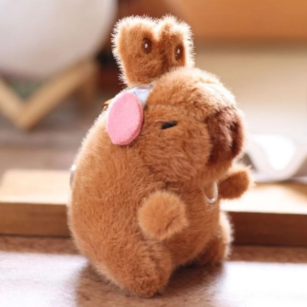 Capybara drôle en peluche pendentif oreilles de lapin mobiles marron dessin animé en peluche porte-clés ailes douces Capybara en peluche porte-clés