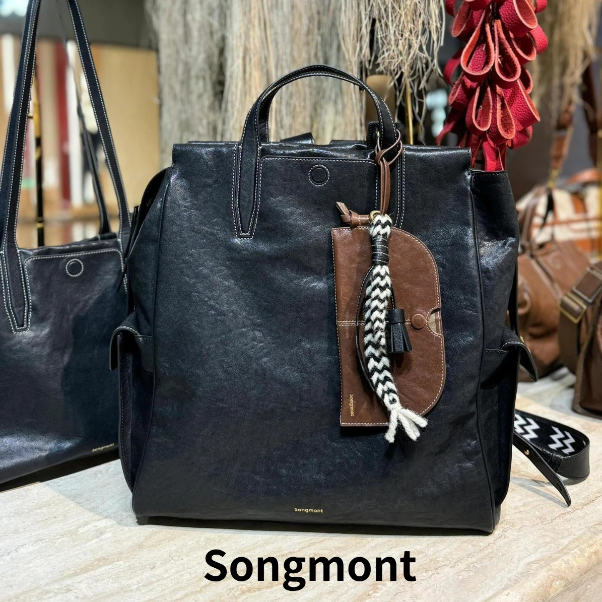 

Songmont Large Backpack for 16 Inch Laptop, Unisex Vintage Vegetable Tanned Leather Bag