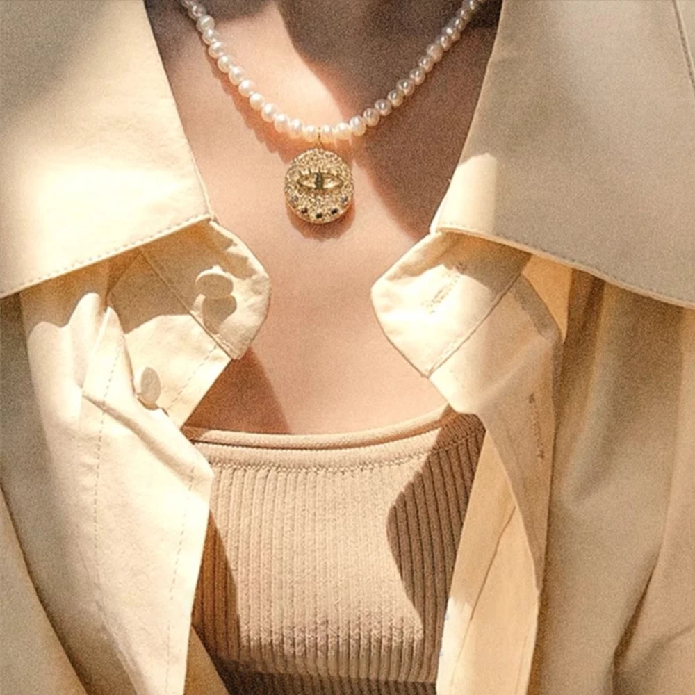 

Vintage jewelry fashion Classic Luxury temperament Natural pearls with Devil's Eyes pendant necklace for women