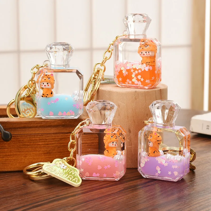 Fashion Oil Quicksand Floating Tiger Perfume Bottle Keychain Cute Animal Baby Doll Sakura Love Key Chain Girl Bag Pendant Gifts