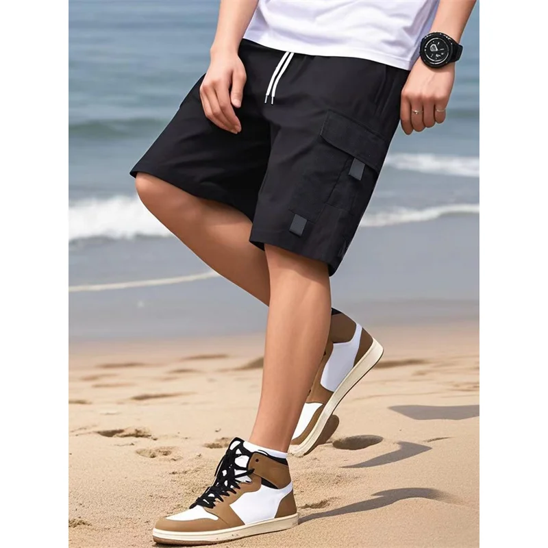 2025 صيف جديد نمط الرجال لون نقي عادية الرياضة الركض البضائع السراويل الرجال فضفاضة مستقيم الساق متعددة جيب خمسة أرباع السراويل ﻿