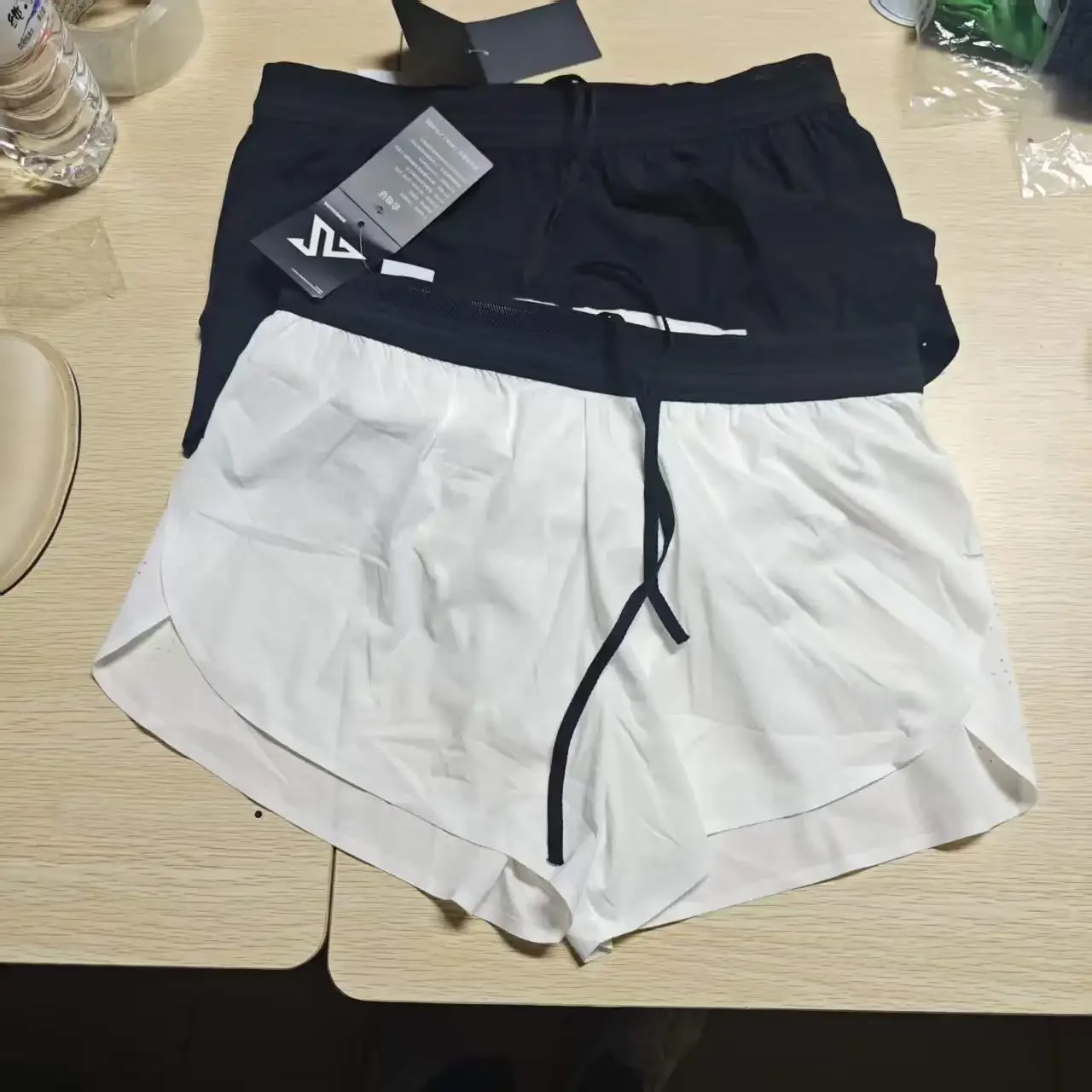 2026Summer sports shorts men's and women's same running quick-drying racing three-point training lined fanny pack pants YYS2003