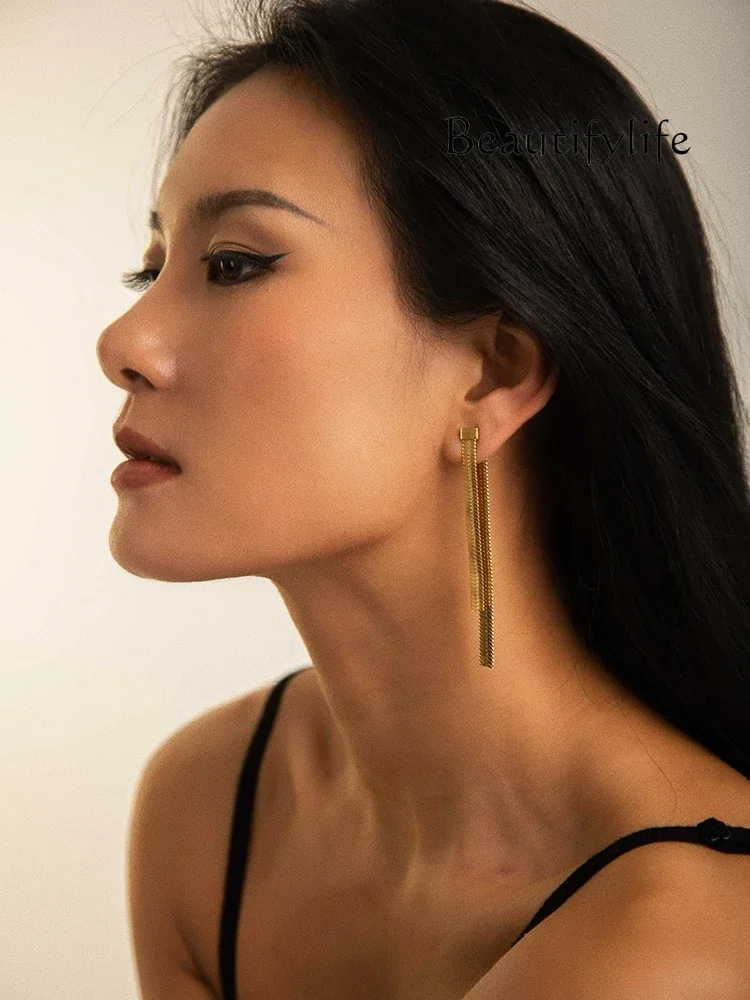 European and American style long metal snake bone chain front and rear earrings 18K gold earrings creative personality