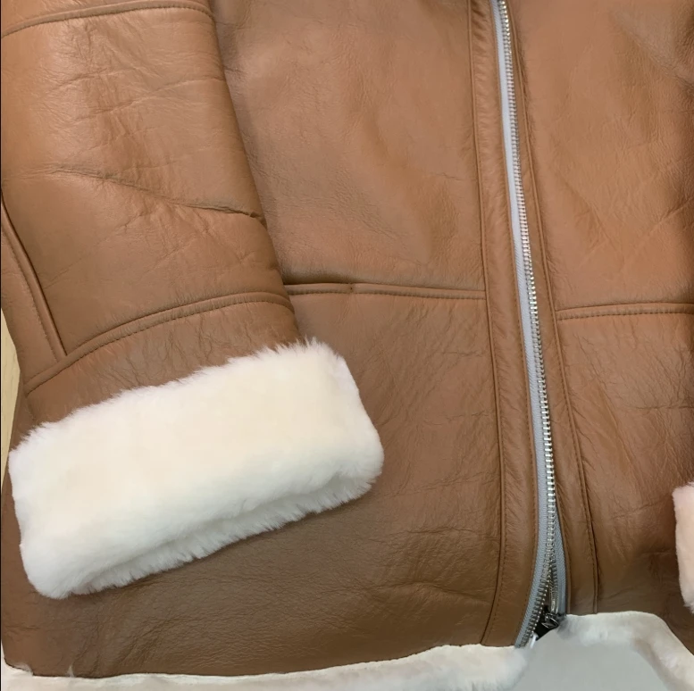 سترة نسائية من فرو الغنم الأصلي بياقة متوسطة الطول وفضفاضة عصرية للشتاء وسميكة ودافئة