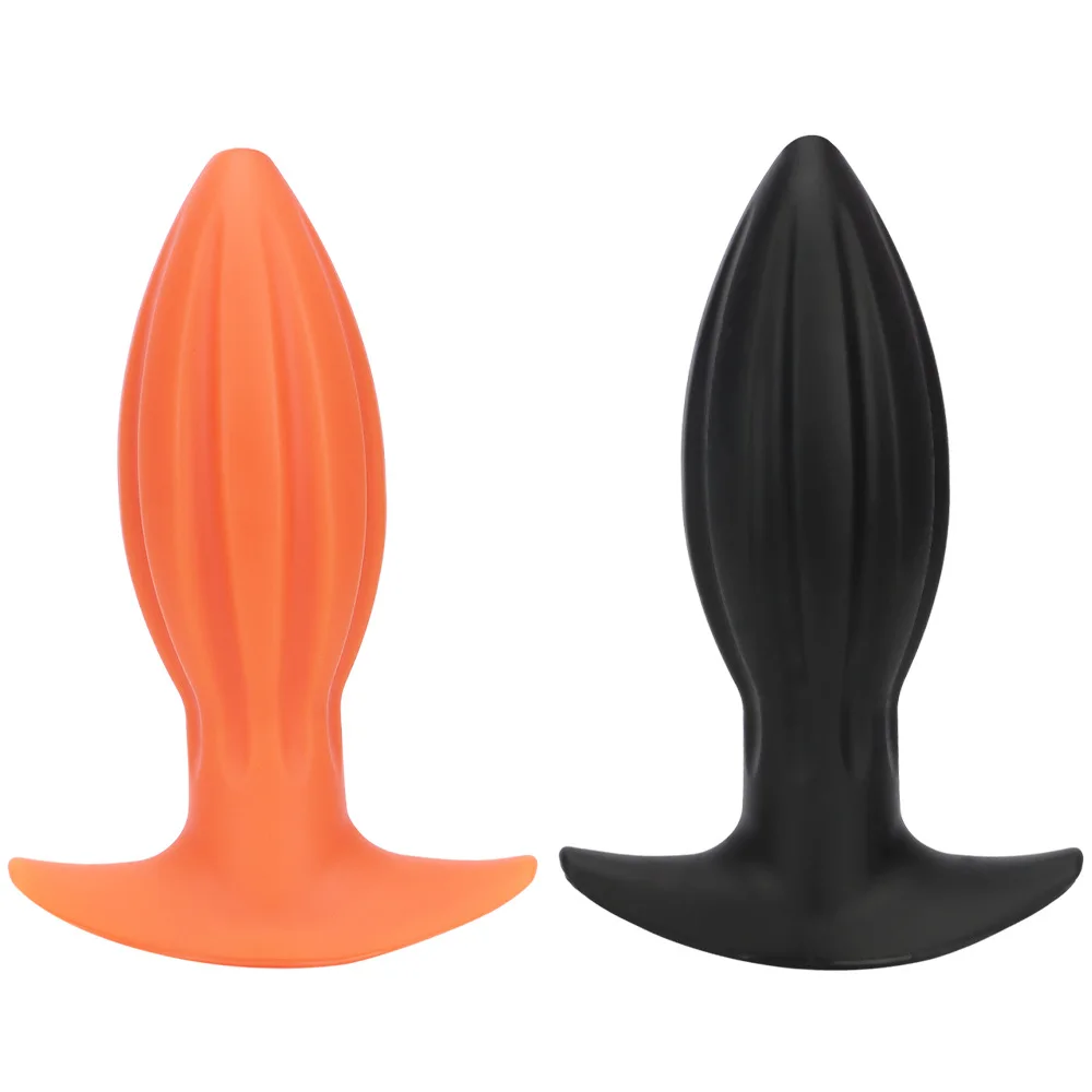 Extra large silicone anal plug wearing anal dilators to stimulate adult sexual pleasure