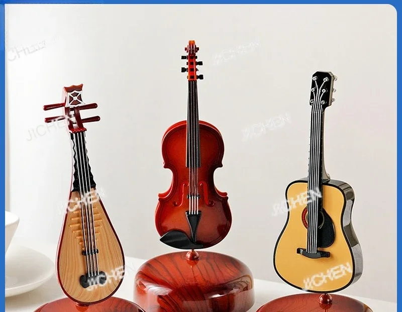 

Гладительский и классический стиль, креативная вращающаяся пепа, гитара, скрипка, музыкальная шкатулка, музыкальная шкатулка, настольное украшение