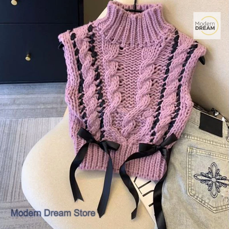 Gilet lavorato a maglia a collo mezzo alto da ragazza speziata dolce in stile coreano, design di nicchia autunnale e invernale da donna con top senza maniche con fiocco.