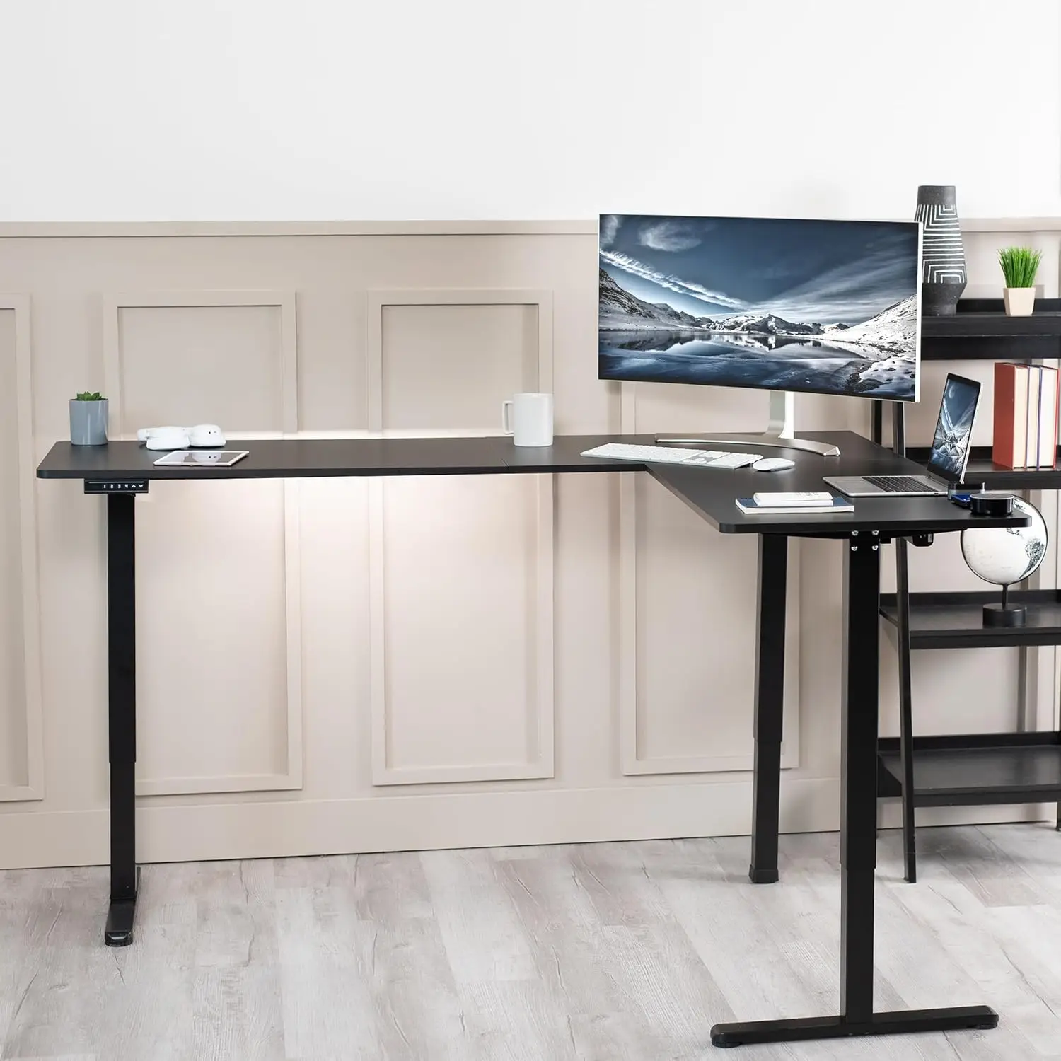 Electric L-shaped 75 x 63 inch standing desk with adjustable height, memory controller, black top and black frame