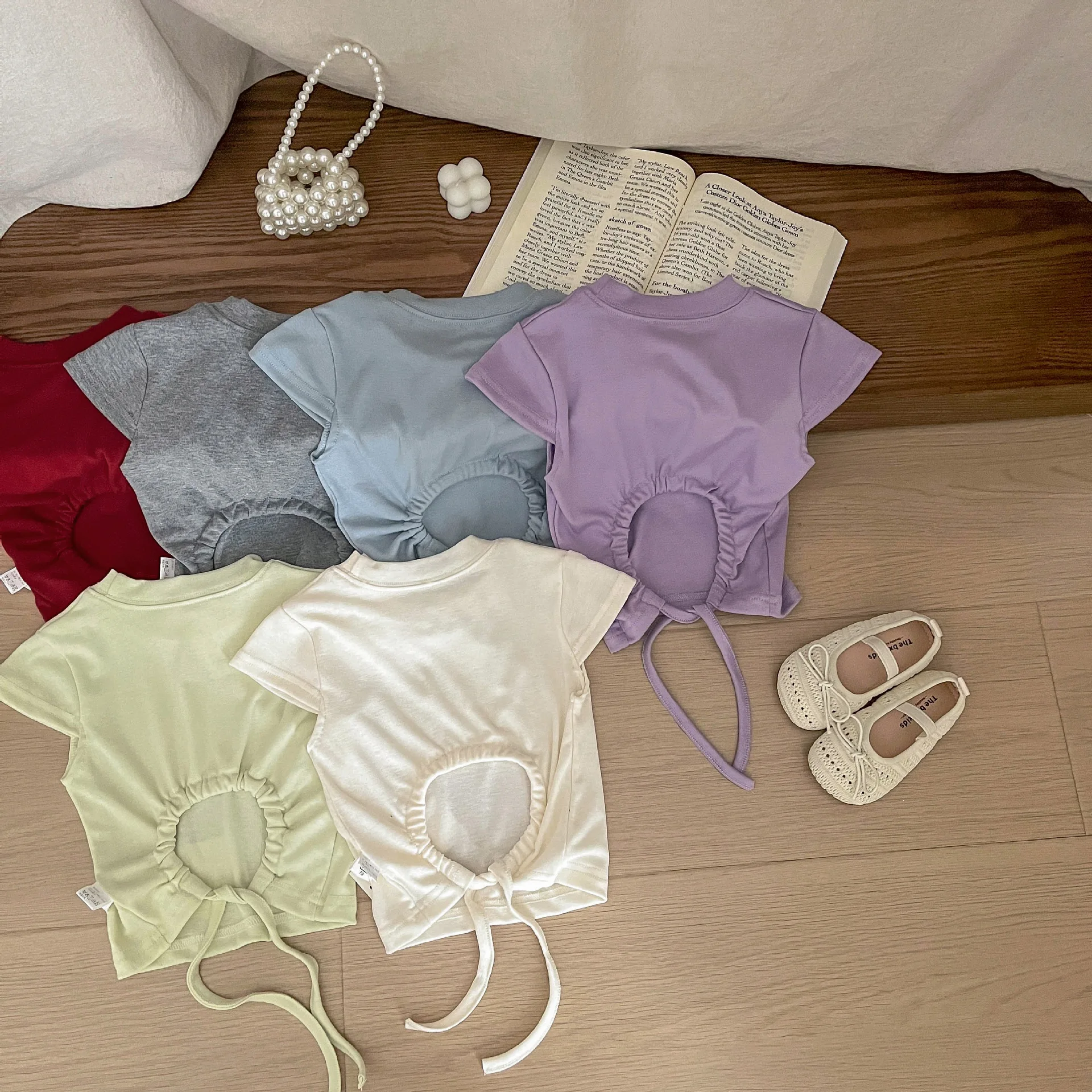 

2026 Summer New Girls Short Sleeve T Shirts Children Solid Tee Cotton Fashion Baby Girl Open Back T Shirt Infant Bow Tops