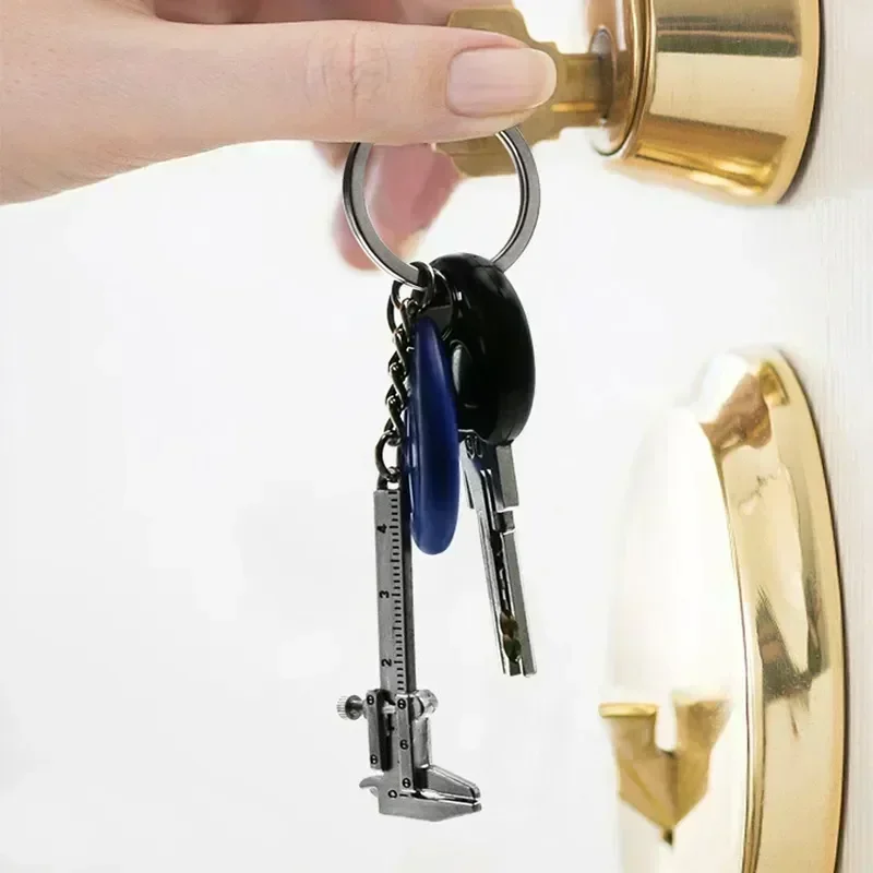 1pcs Portable Mini Vernier Caliper Keychain Mini Metal Ruler Car Key Chain Movable Vernier Caliper Ruler Model Keychain Keyring