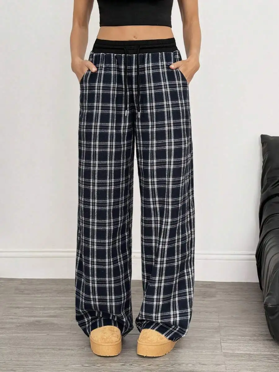 

Женские широкие брюки в клетку с завязками на талии и карманами