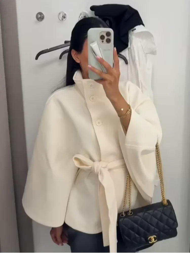 

Белая женская шерстяная куртка с поясом на шнуровке и длинным расклешенным воротником, однобортное пальто-стойка, новинка 2025 года, женская элегантная уличная одежда