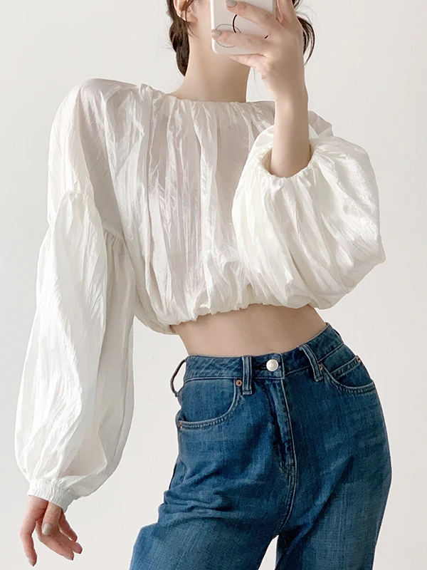 

Spring 2023 Sanan Pure Color l Pleated Pearl Material Lantern Sve irt Overhead Loose Fit Long Sve round Ne irt