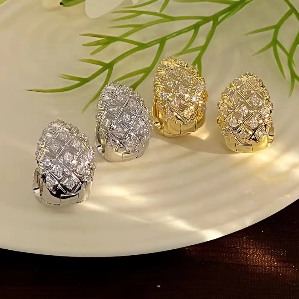 

Lingge patterned earrings, sparkling water droplet design, Japanese and Korean fashionable golden earrings, Christmas gift.