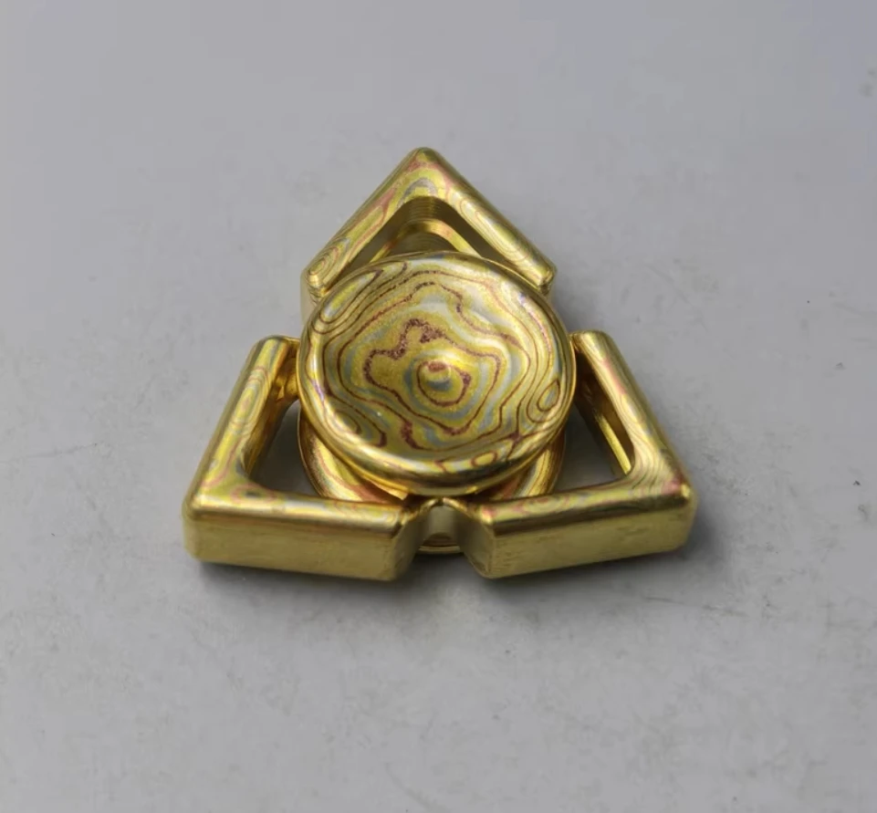 Używany spinner EDC Linglong Mokume, zabawka antystresowa.