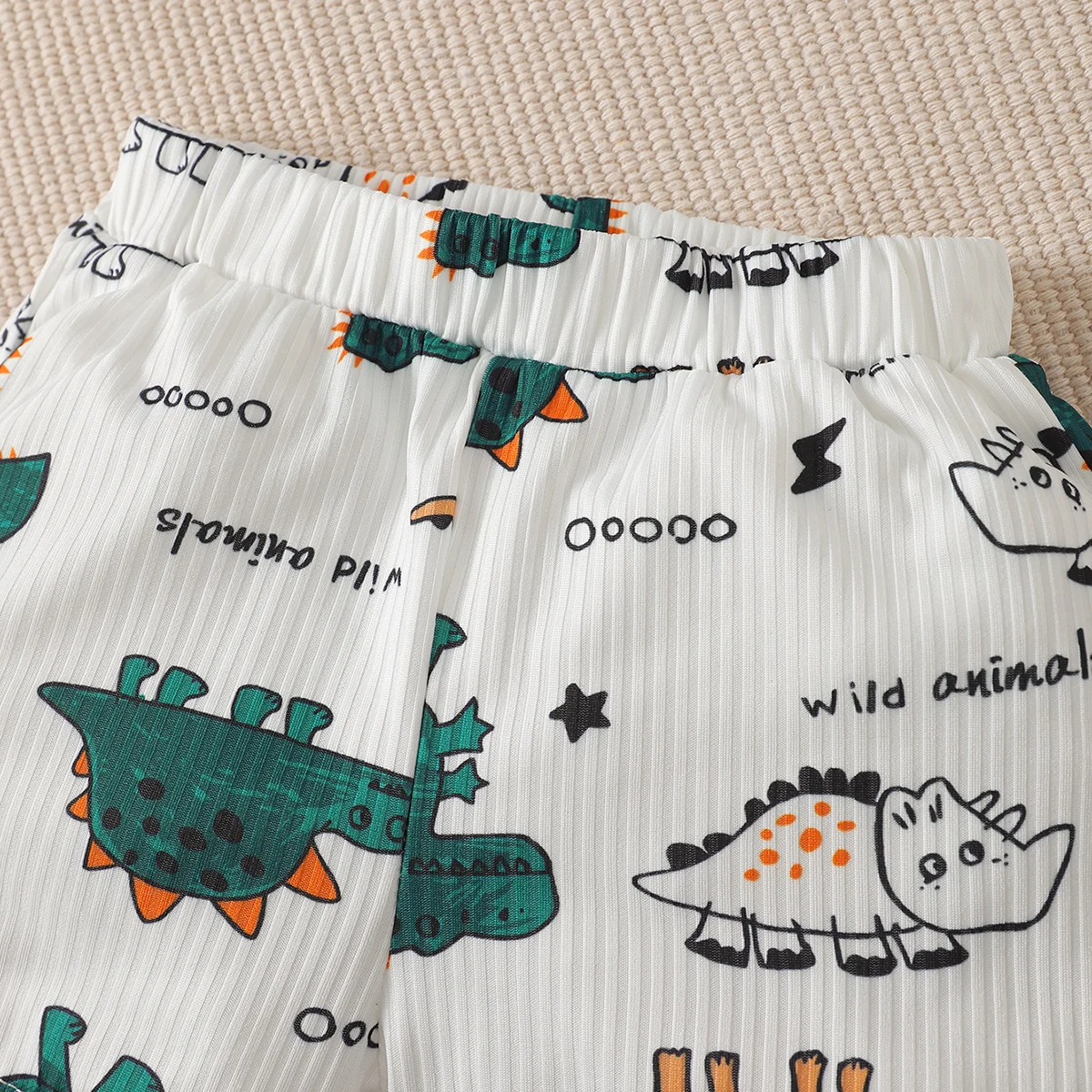 Boys and girls summer short-sleeved dinosaur letter pattern pit stripe material T-shirt and shorts set