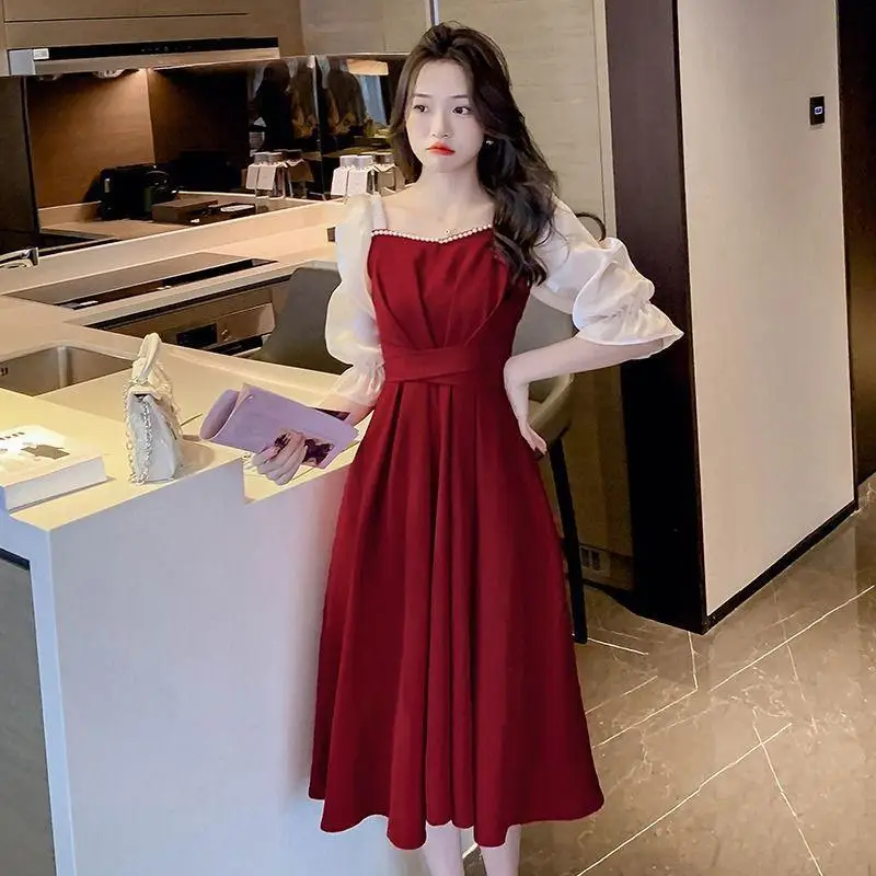 Doce vestido vermelho francês feminino, mangas cinco quartos, coleção primavera, emagrecimento e redução da cintura, saia de comprimento médio, nova