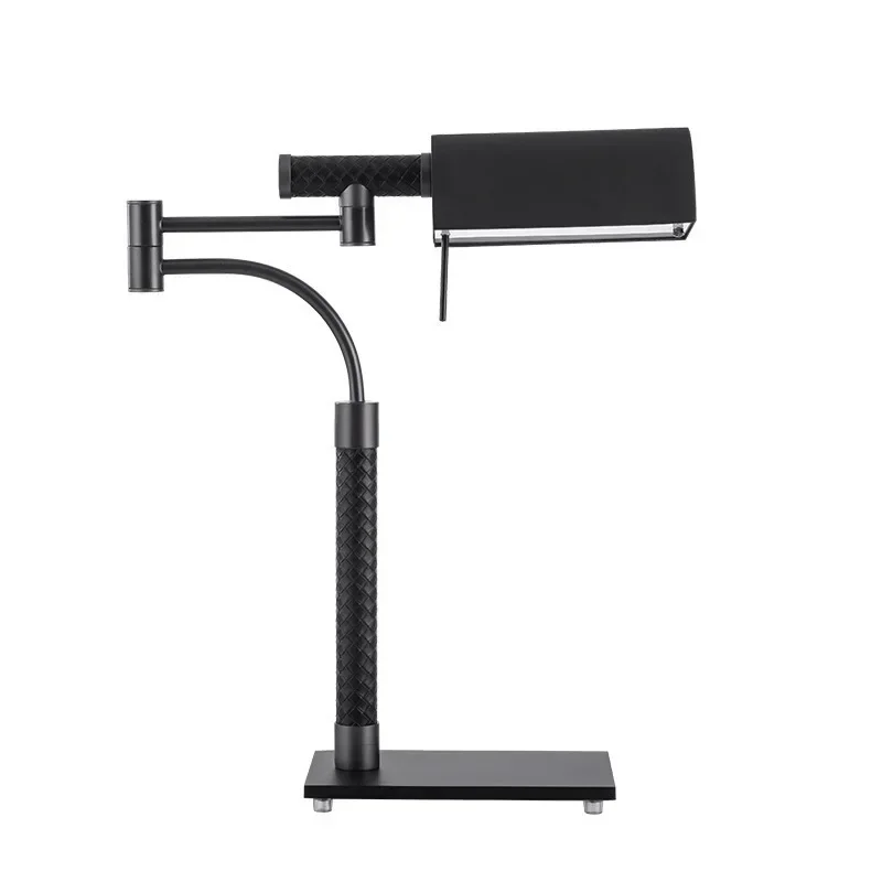 

Black leather hardware desk lamp, decorative desk lamp in the model room of the hotel engineering sales office