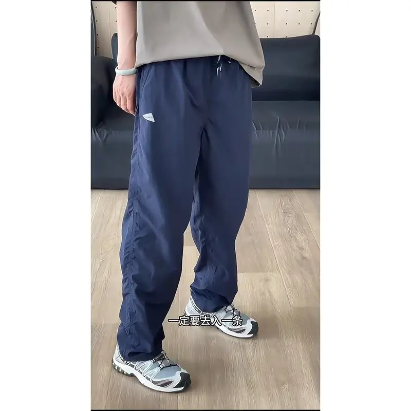 

Navy blue triangle logo pants men's summer thin quick drying waterproof assault pants straight leg outdoor sports work pants