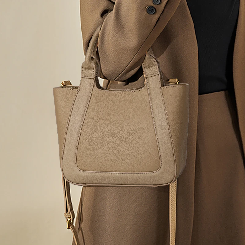 

Aidrani Beige Leather Tote: Sleek Silhouette, Minimalist Sophistication