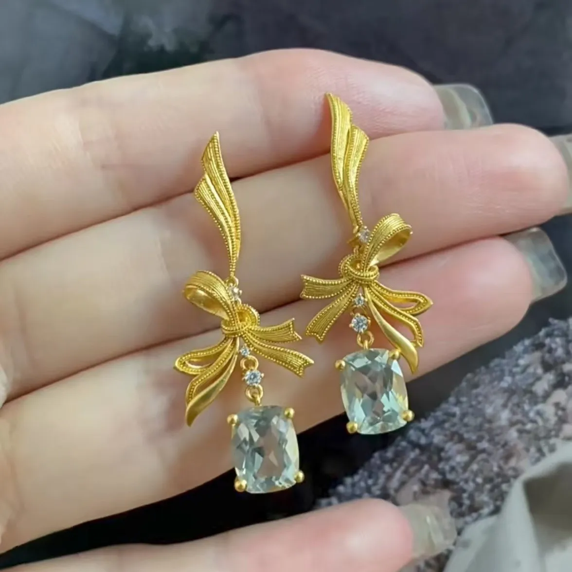 

Women's 24K Gold (AU999) Liquid Ribbon Earrings | Liquid gold ribbon, gold-inlaid with bow symbols