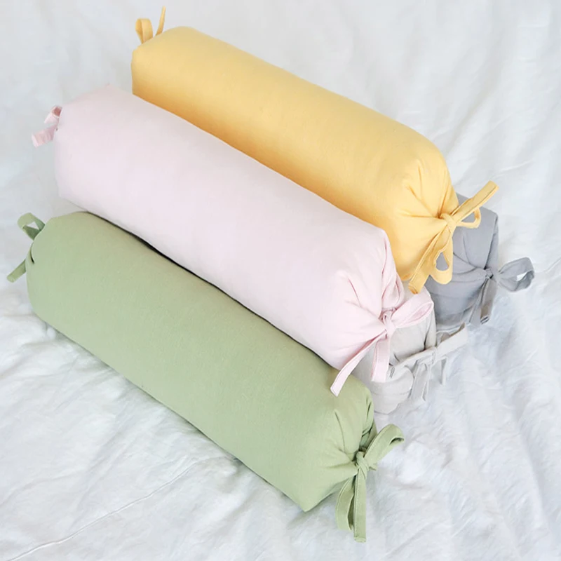 Candy special hard pillow cylindrical single bed to protect cervical vertebra and help sleep.