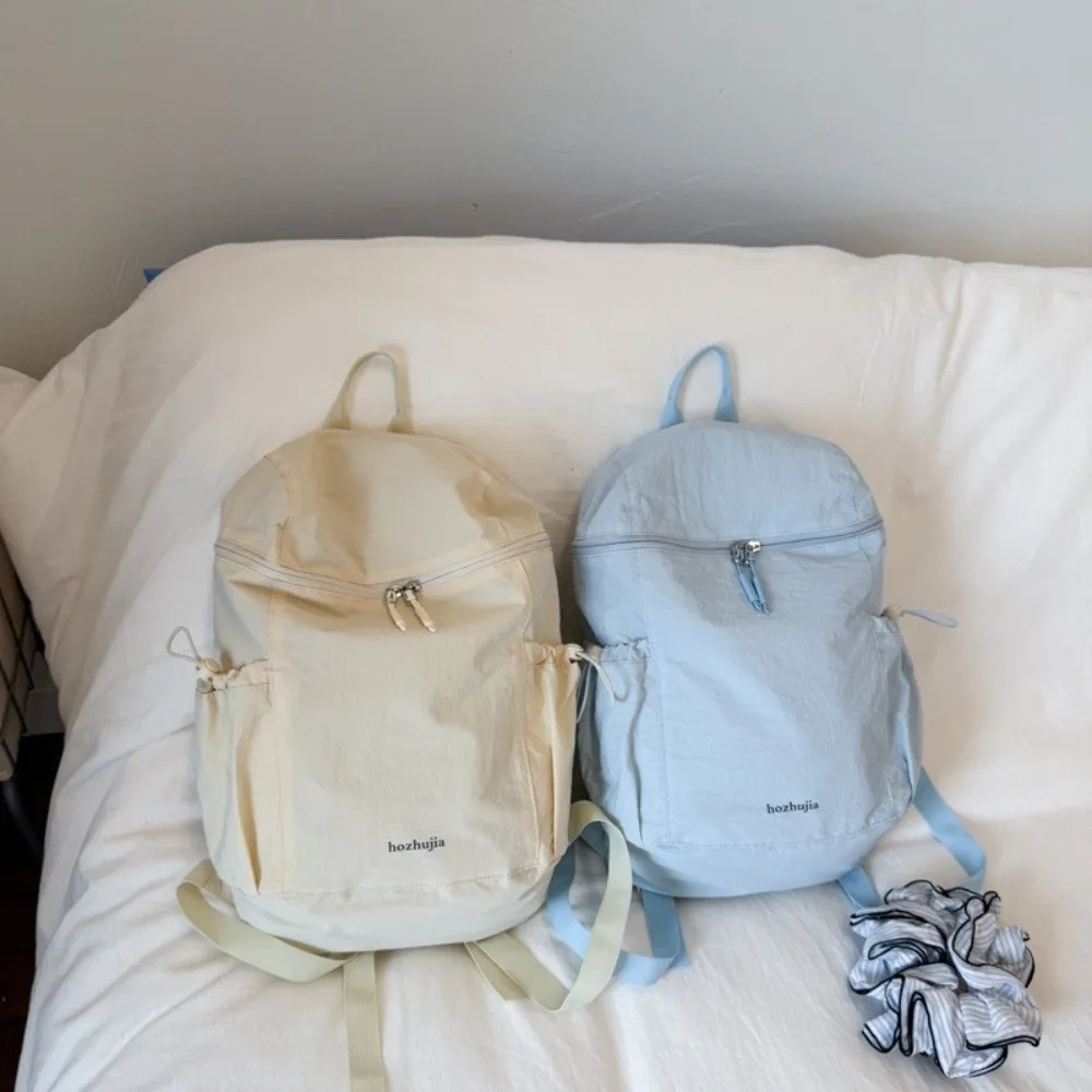 Zaino leggero coreano casual Borse a tracolla in nylon per il tempo libero di grande capacità Zaino per studenti universitari tinta unita unisex