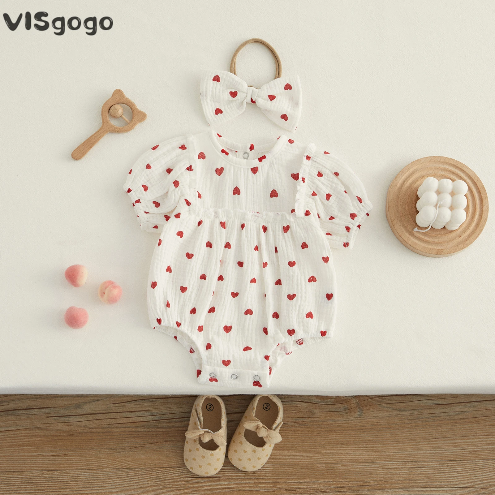 

VISgogo Infant Baby Girl Valentine's Day Rompers Short Puff Sleeve Round Neck Heart Print Bodysuit with Bow Headband Outfit