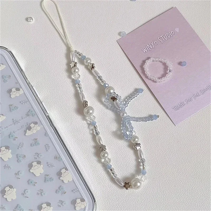 

Korean Cute Bowknot Star Pearl Pendant Beaded Phone Charm For iPhone Accessrioes Universal Lanyard Girl Jewelry Hanging Rope