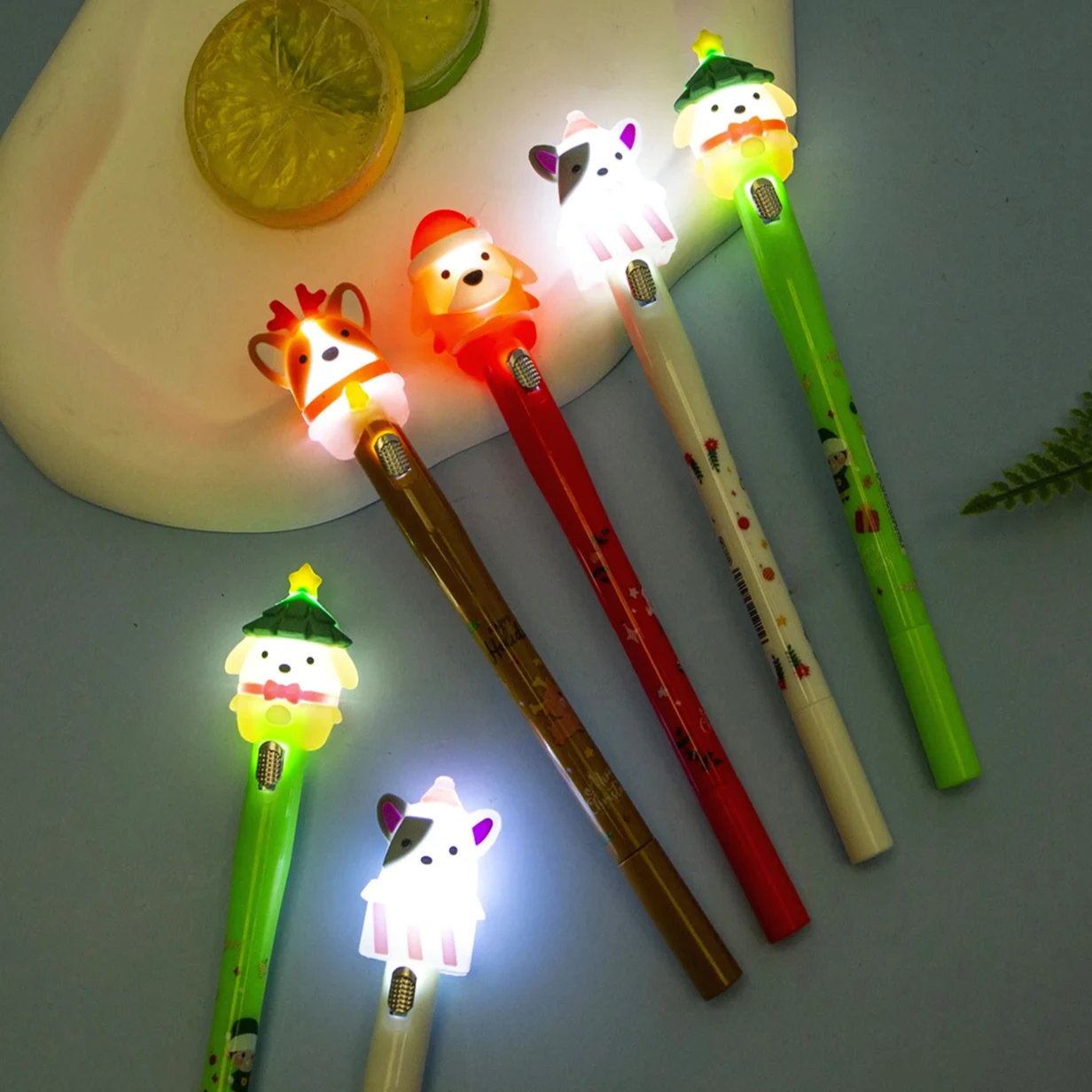 4Pcs/Lot Cute Christmas Luminous Gel Pen Black/Blue Ink LED Ballpoint Pen with Light Kawaii Santa School Office Stationery Gifts